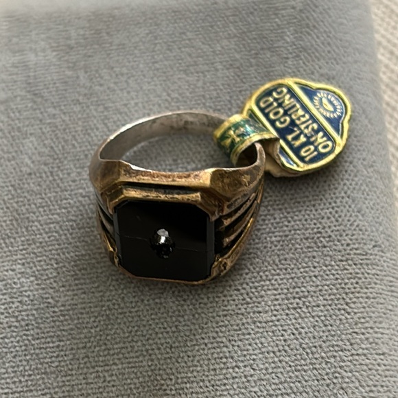 Man’s 10 KT gold on sterling ring with original tag!